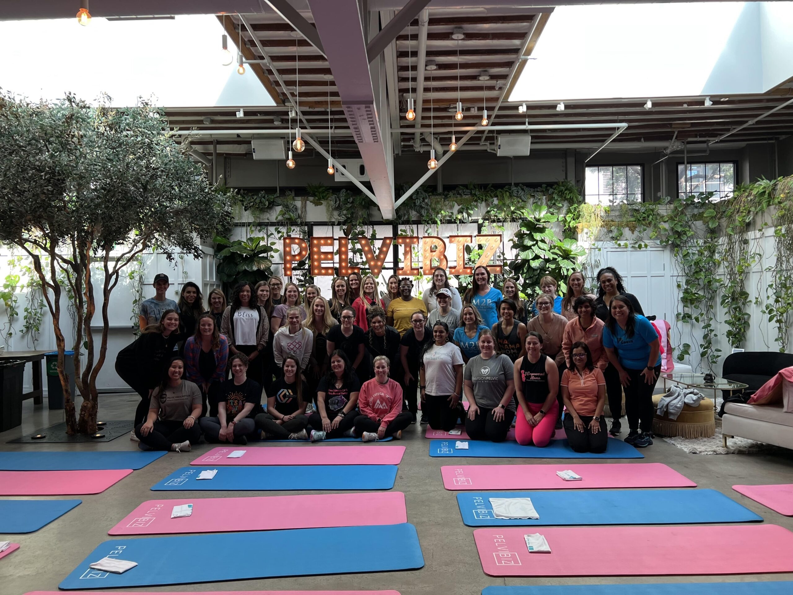 Group photo from PelviBiz healthcare business coaching event with private practice owners scaling their clinics.